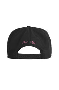 'What To Do' daisy surf cap in black